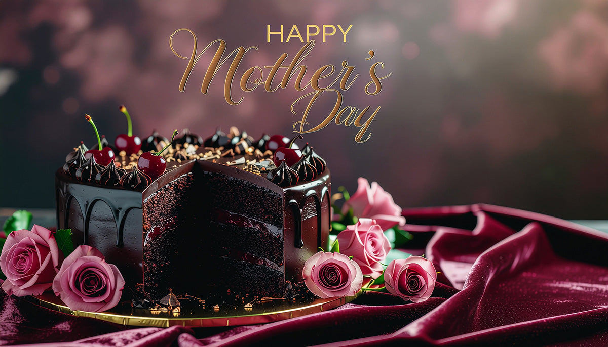 Elegant Mother’s Day banner with a cut-open Black Forest cake on soft pink velvet, surrounded by roses. The cake’s rich layers echo a premium adjustable frame and mattress, while Jersey Knit Stretch Sheets are the cherry on top—luxury for your bedroom.