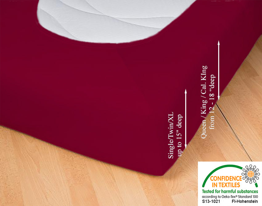 Fitted jersey knit stretch sheet in color 56-bordeaux, underside showing characteristic oval bottom hugging mattress, deep pocket up to 18 in, OEKO-TEX certified – Egino.