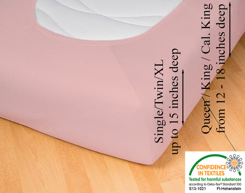 Fitted jersey knit stretch sheet in color 34-rosé, underside showing characteristic oval bottom hugging mattress, deep pocket up to 18 in, OEKO-TEX certified – Egino.