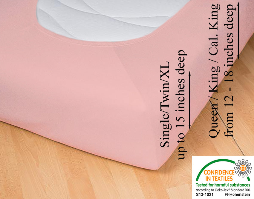 Fitted jersey knit stretch sheet in color 34-rosé, underside showing characteristic oval bottom hugging mattress, deep pocket up to 18 in, OEKO-TEX certified – Egino.