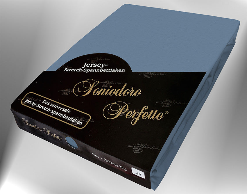 EGINO azure jersey knit stretch sheet (40-Azure) in retail packaging, under dim light.