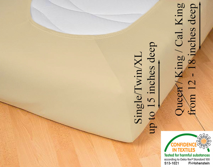 Fitted jersey knit stretch sheet in color 26-sand, underside showing characteristic oval bottom-hugging mattress, deep pocket up to 18 in, OEKO-TEX certified – Egino.