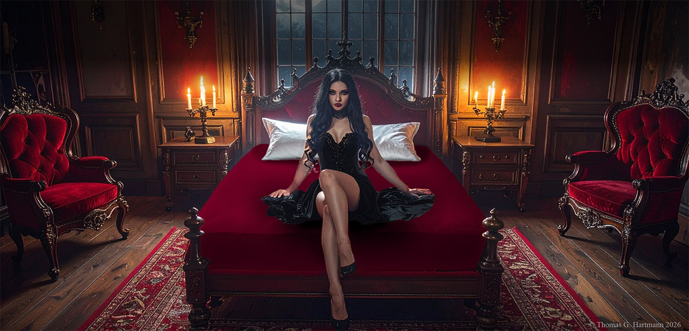 EGINO jersey stretch sheet in a dramatic crimson bed setting within a candlelit gothic castle bedroom, moonlit arched window in the background