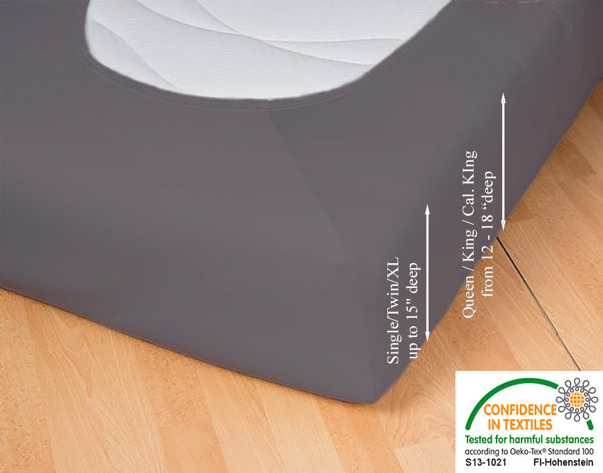 Fitted jersey knit stretch sheet in color 48-graphite, underside showing characteristic oval bottom hugging mattress, deep pocket up to 18 in, OEKO-TEX certified – Egino.