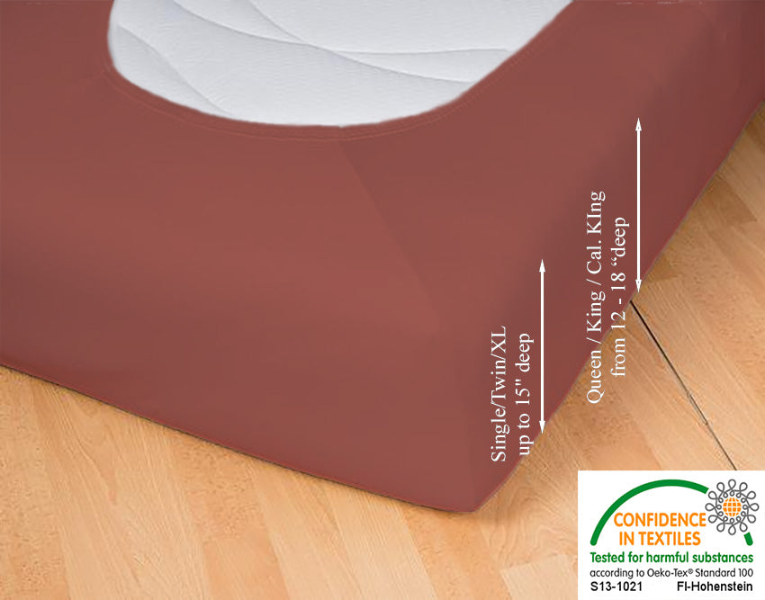 Fitted jersey knit stretch sheet in color 55-redwood, underside showing characteristic oval bottom hugging mattress, deep pocket up to 18 in, OEKO-TEX certified – Egino.
