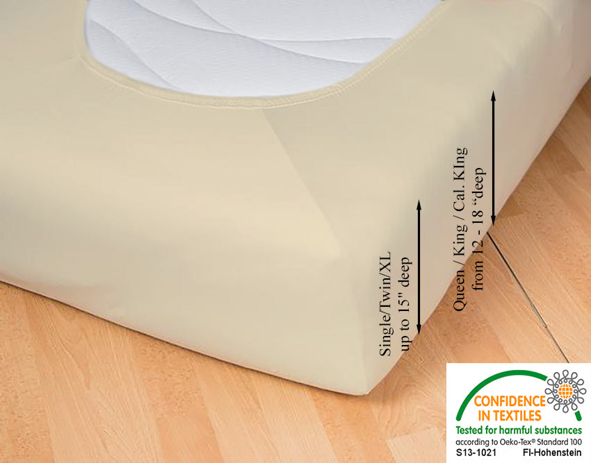 Fitted jersey knit stretch sheet in color 26-sand, underside showing characteristic oval bottom hugging mattress, deep pocket up to 18 in, OEKO-TEX certified – Egino.