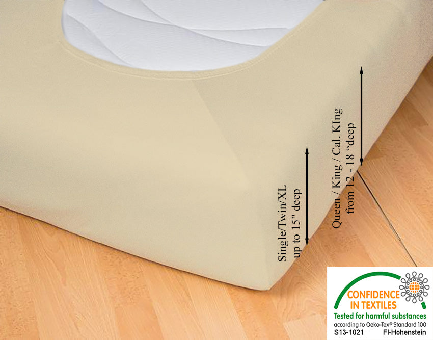 Fitted jersey knit stretch sheet in color 26-sand, underside showing characteristic oval bottom hugging mattress, deep pocket up to 18 in, OEKO-TEX certified – Egino.