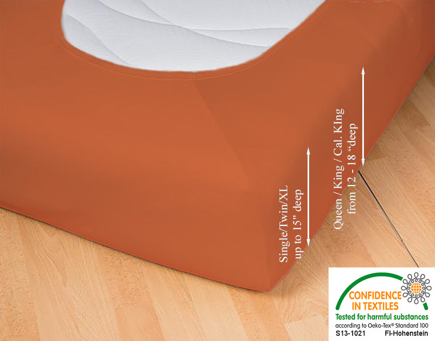 Fitted jersey knit stretch sheet in color 52-terracotta, underside showing characteristic oval bottom hugging mattress, deep pocket up to 18 in, OEKO-TEX certified – Egino.