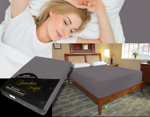 Person sleeping undisturbed on deep adjustable bed with Egino Jersey knit stretch sheet in color 48-graphite