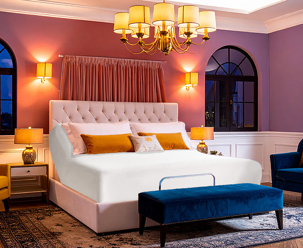 Jersey knit stretch fitted sheet on an adjustable bed, sized for up to 18-inch deep mattresses in a modern, fashion-forward bedroom.