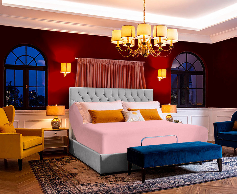 Jersey knit stretch fitted sheet on an adjustable bed, sized for up to 18-inch deep mattresses in a modern, fashion-forward bedroom decorated for Valentine's Day.