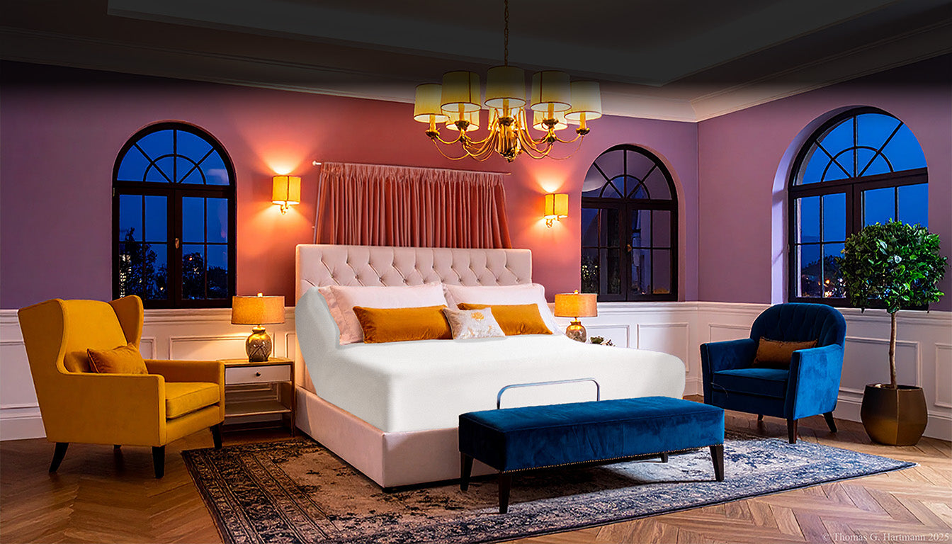 Jersey knit stretch fitted sheet on an adjustable bed, sized for up to 18-inch deep mattresses in a modern, fashion-forward bedroom.