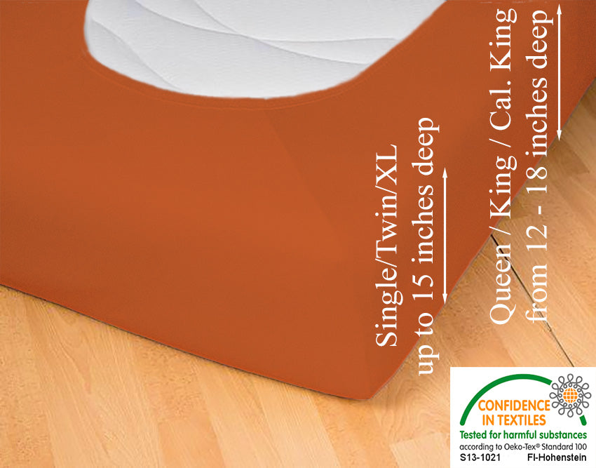 Fitted jersey knit stretch sheet in color 52-terracotta, underside showing characteristic oval bottom hugging mattress, deep pocket up to 18 in, OEKO-TEX certified – Egino.