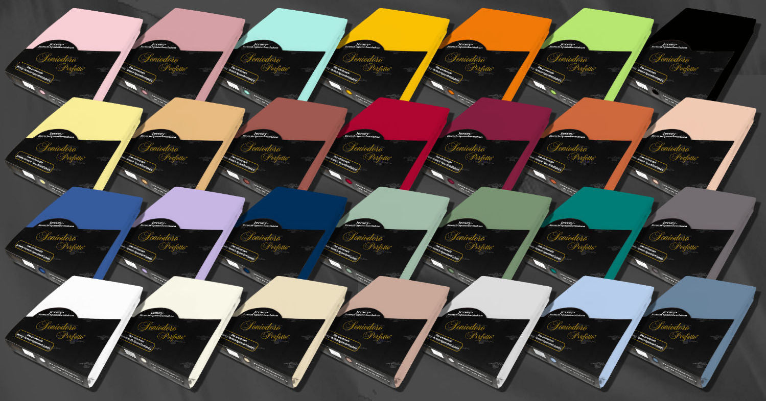 Our Perfetto Jersey knit stretch sheets in 28 vibrant colors by EGINO on a dark background.