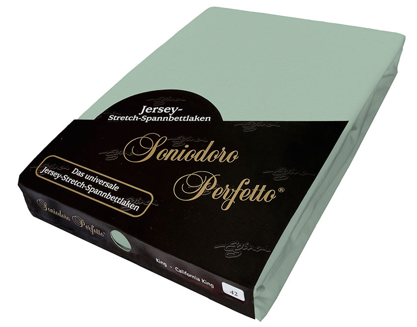 EGINO Bluegrass jersey-knit stretch sheet in original German packaging. A 96/4 wellness essential recalling dew-kissed blooming meadows at dawn—a tranquil, elegant, and sophisticated bedroom foundation.