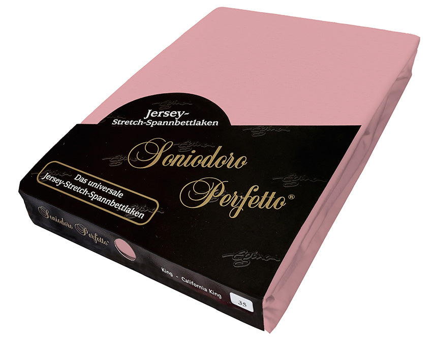 EGINO Old Rose jersey-knit stretch sheet in original German packaging. A 96/4 wellness essential that tempers raspberry pink with a hint of white for a sophisticated, calming, and refined bedroom foundation.