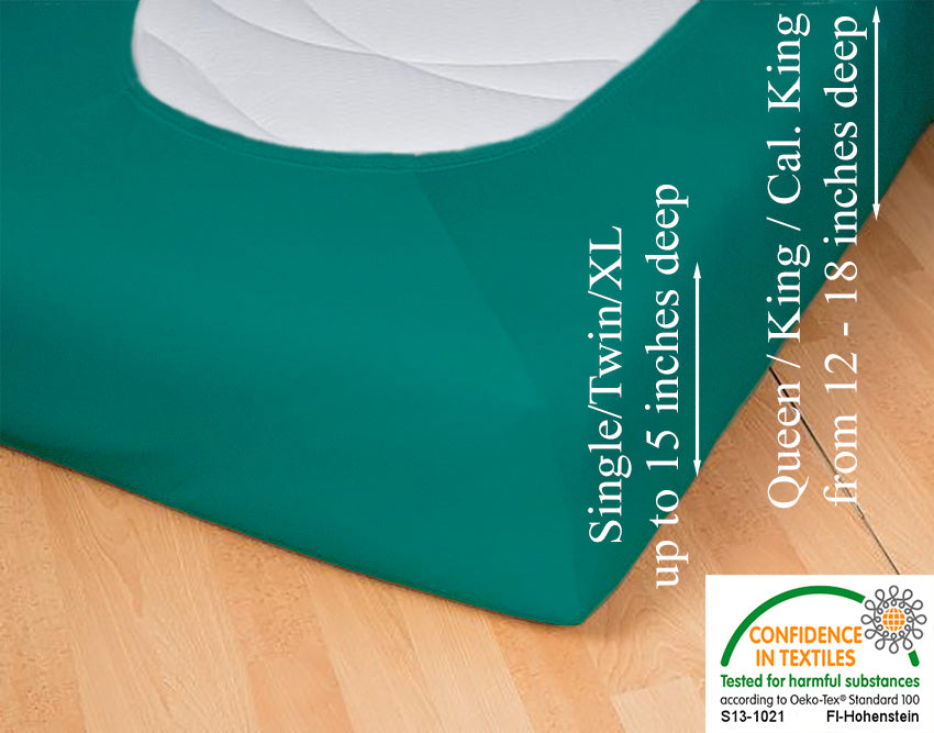 Fitted jersey knit stretch sheet in color 53-evergreen, underside showing characteristic oval bottom-hugging mattress, deep pocket up to 18 in, OEKO-TEX certified – Egino.