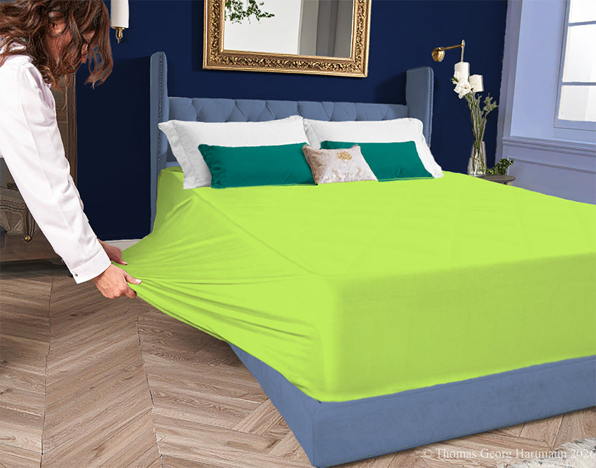 Green Apple 96/4 jersey-knit sheet on a deep mattress—pulling the sidewall over a foot outward for a quick change. Pair this vivid shade with white, blues, or deep green for an energetic and adventurous contrast.