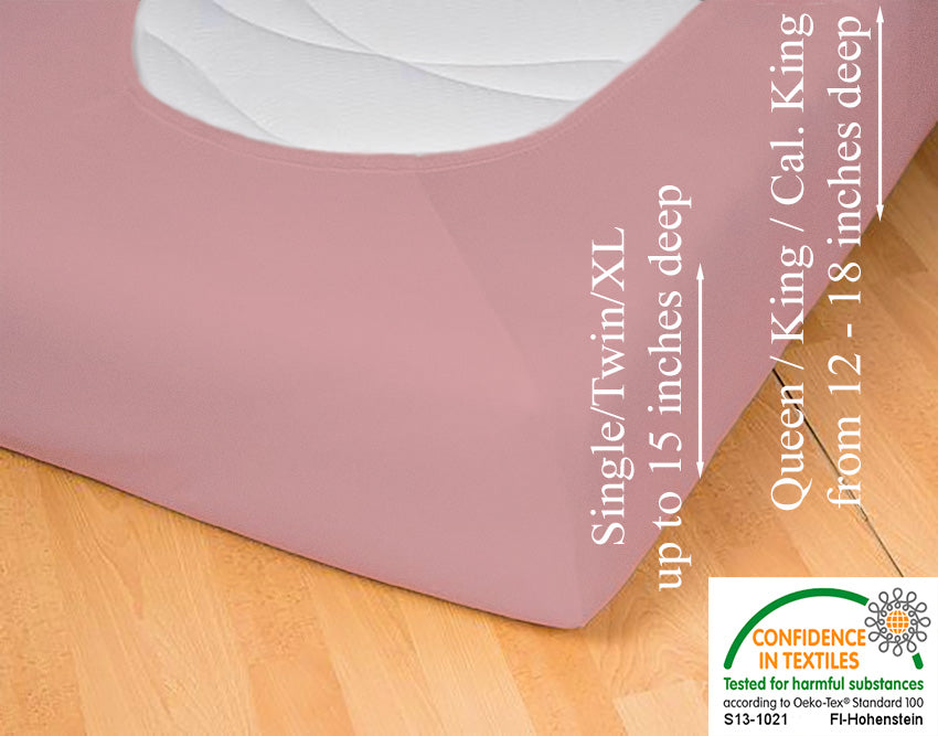 Fitted jersey knit stretch sheet in color 35-old-rose, underside showing characteristic oval bottom-hugging mattress, deep pocket up to 18 in, OEKO-TEX certified – Egino.