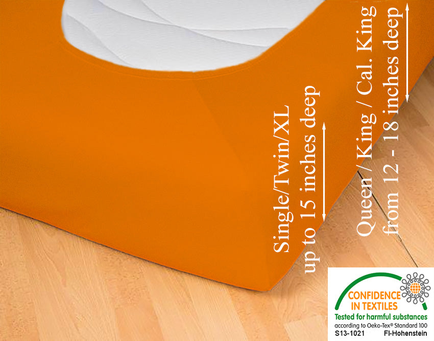 Fitted jersey knit stretch sheet in color 50-orange, underside showing characteristic oval bottom-hugging mattress, deep pocket up to 18 in, OEKO-TEX certified – Egino.