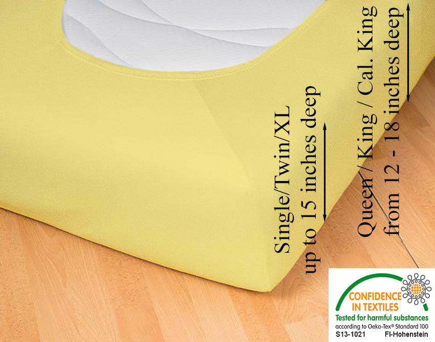 Fitted jersey knit stretch sheet in color 24-sun, underside showing characteristic oval bottom-hugging mattress, deep pocket up to 18 in, OEKO-TEX certified – Egino.