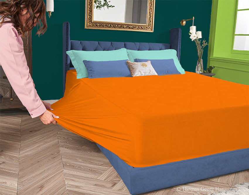 Orange 96/4 jersey-knit sheet on a deep mattress—pulling the sidewall over a foot outward for a quick, time-saving change. This juicy, youthful hue dazzles beside lush greens or stark black, delivering a bold, adventurous style.