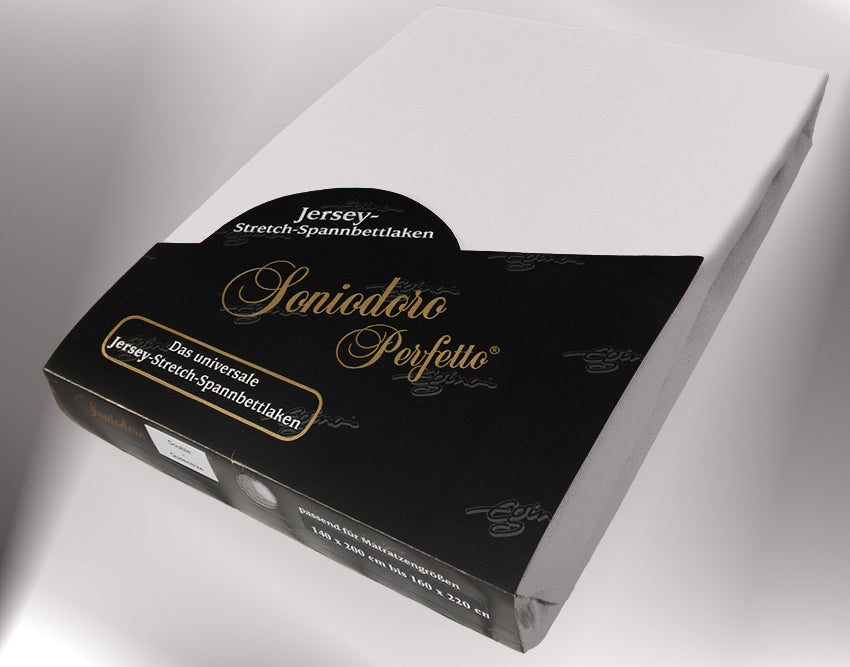 EGINO silver jersey knit stretch sheet (29-Silver) in retail packaging, under dim light
